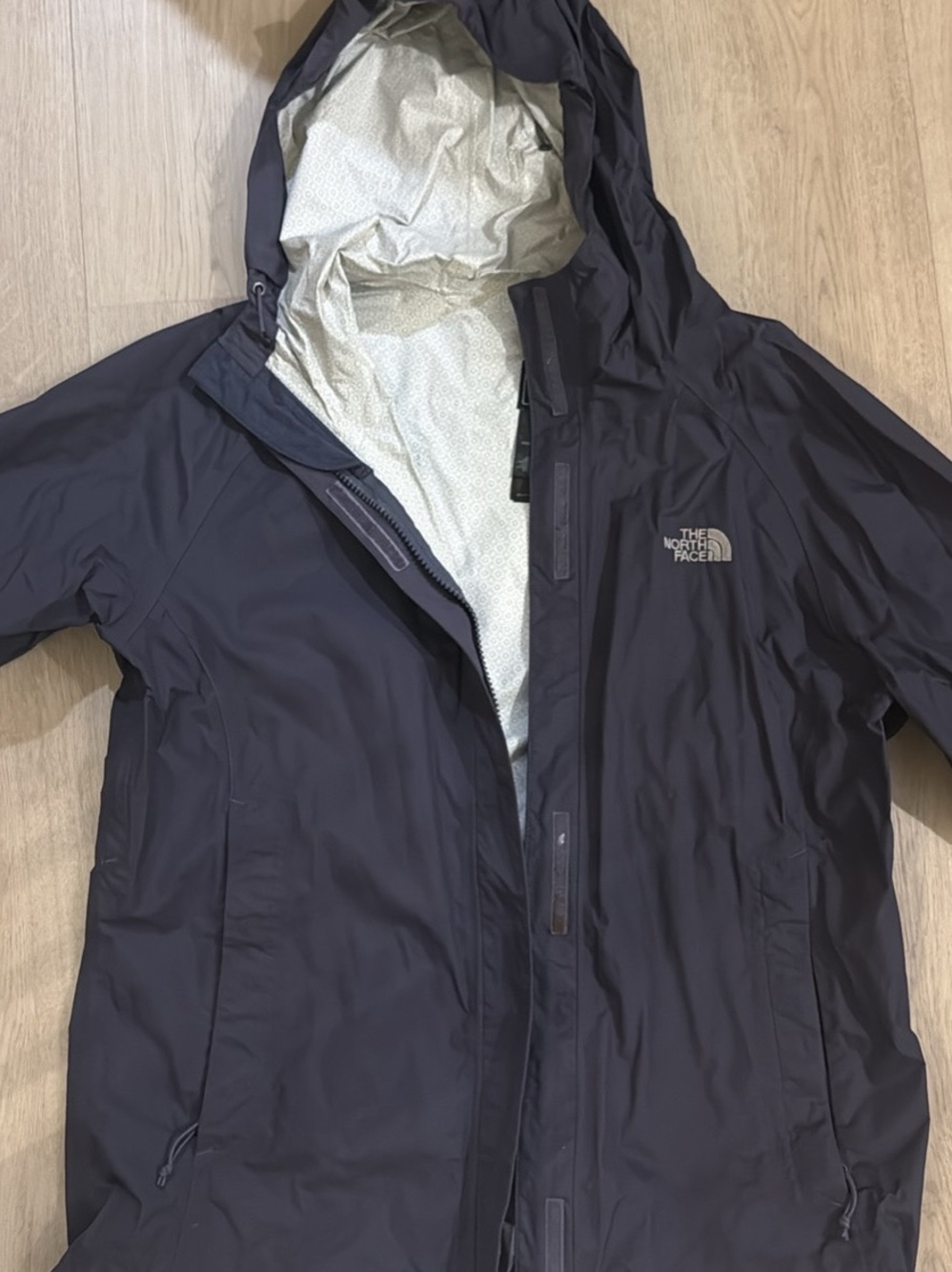 The North Face women’s Hooded Raincoat - Navy